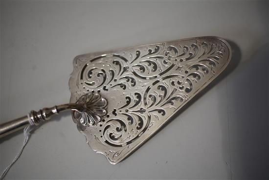 An early George III pierced silver fish slice, 32cm.
